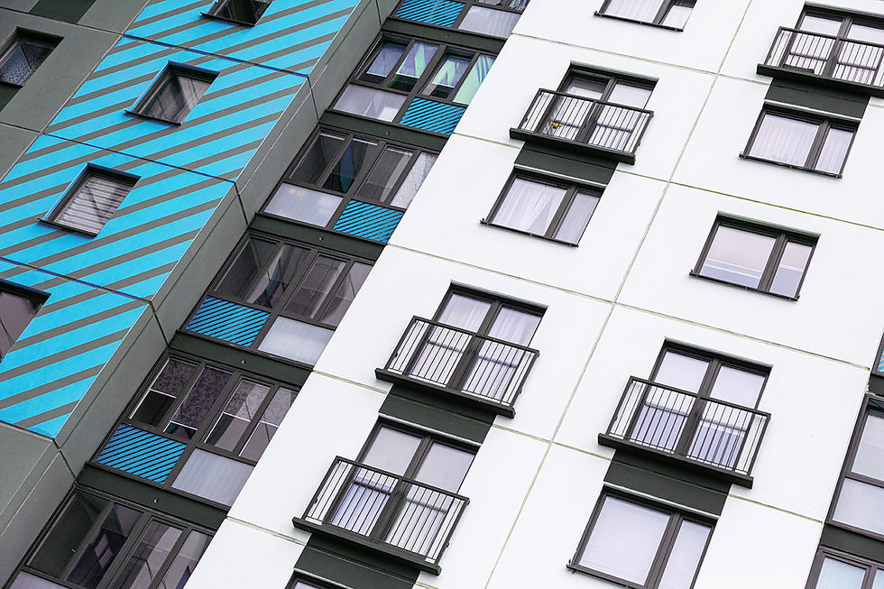 The front of a modern high-rise residential building